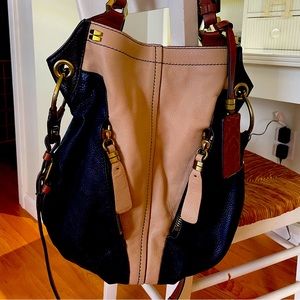 OrYani Hobo-navy, cream, and tan with gold hardware, zippers, green lining